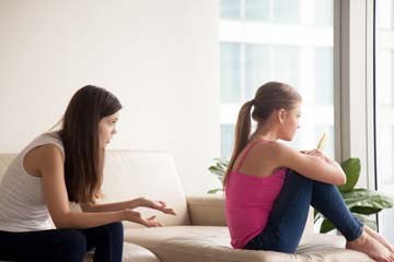 Two young woman in an argument