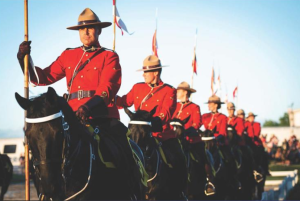 Group of RCMP officers riding horses