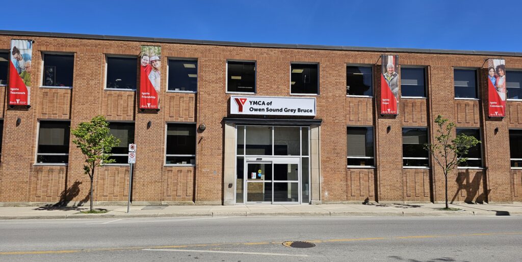 Front entrance street view of 290 9th Street East Owen Sound. Home of YMCA of Owen Sound Grey Bruce Community Initiatives, Settlement Services, Employment Services and Association Services.